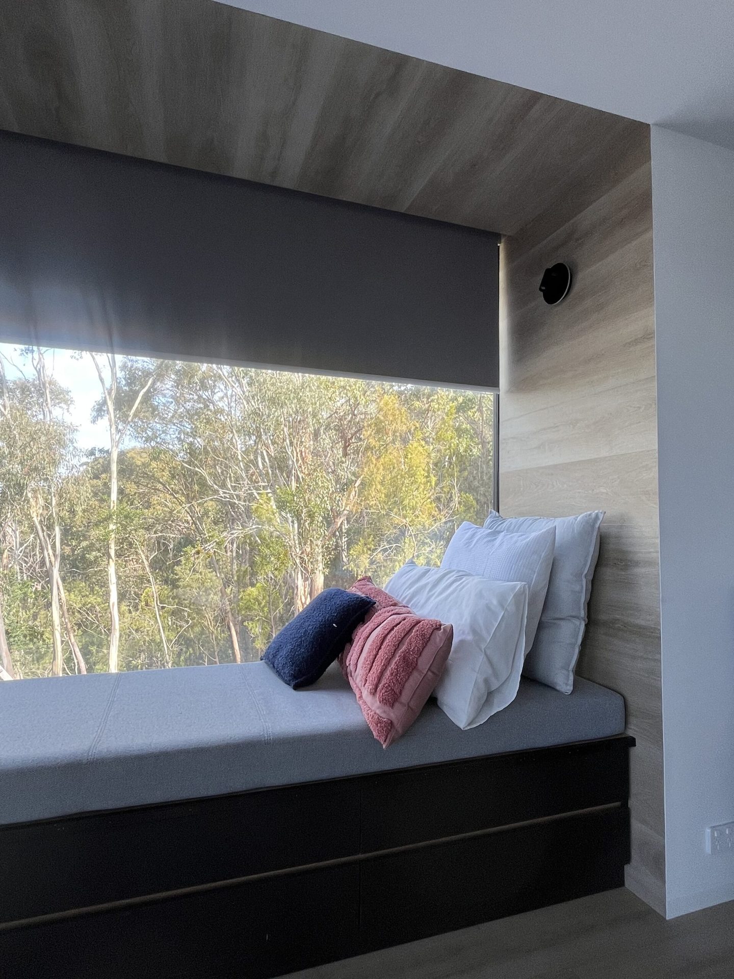 Blockout roller blind above a built in window seat